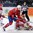 OSTRAVA, CZECH REPUBLIC - MAY 9: Denmark's Sebastian Dahm #32 makes a toe save off a shot from Norway's Niklas Roest #28 during preliminary round action at the 2015 IIHF Ice Hockey World Championship. (Photo by Andrea Cardin/HHOF-IIHF Images)

